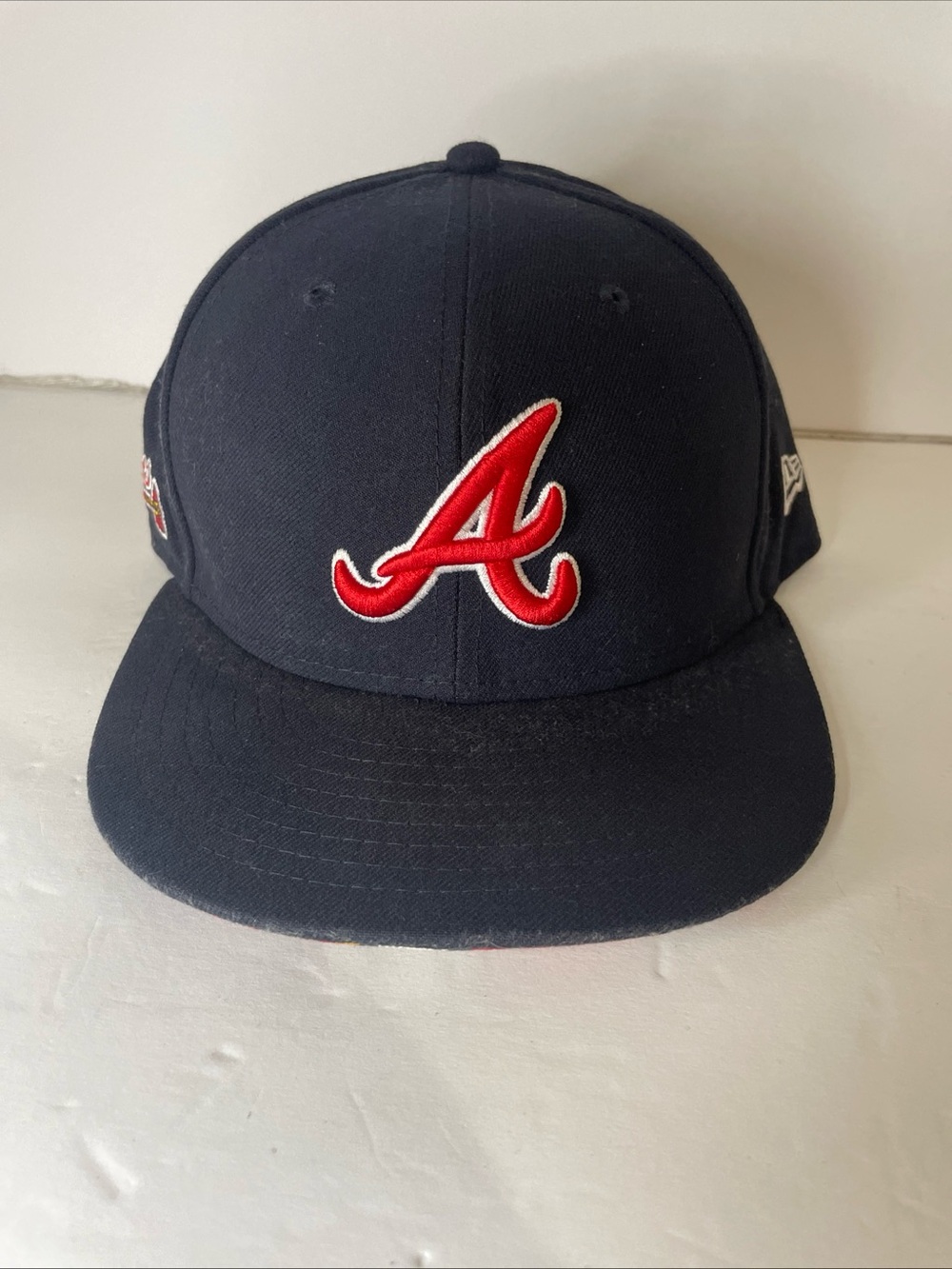 New Era 59FIFTY fitted Atlanta Braves hat with vibrant graffiti-style print